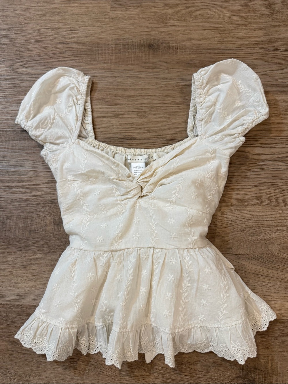 Altar'd State | Mari Embroidered Eyelet Babydoll Peplum Top | Cream | XXS